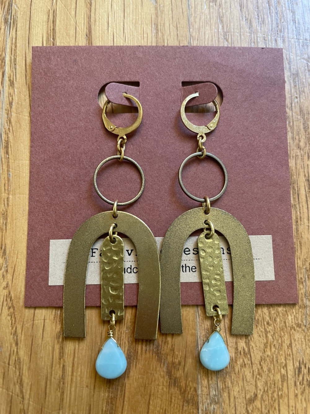 NWT Gold and Brass Arch Drop Earrings with Light Blue Teardrops